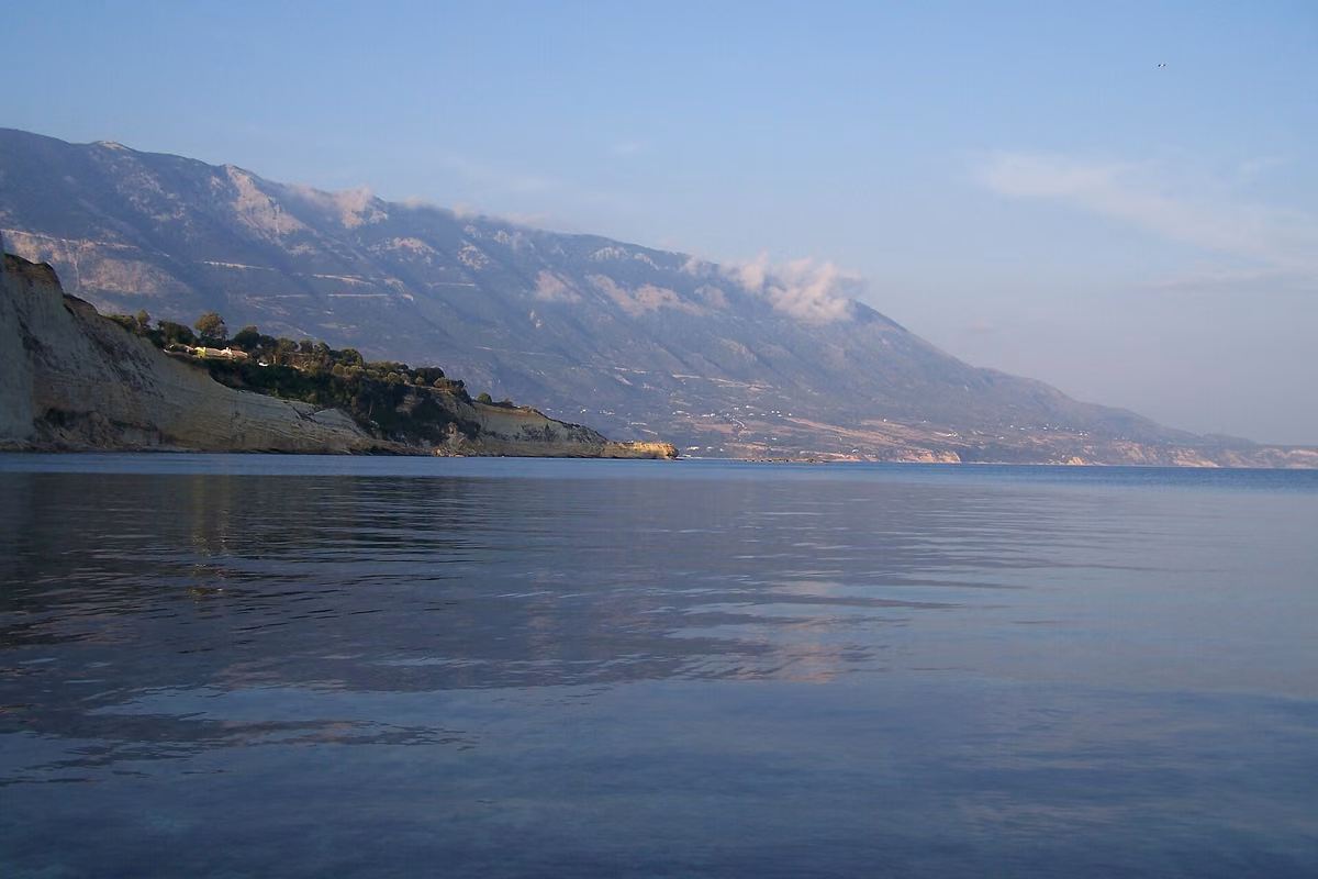 The Ainos massif rising above the Kefalonian coast, cloud sitting on its ridge