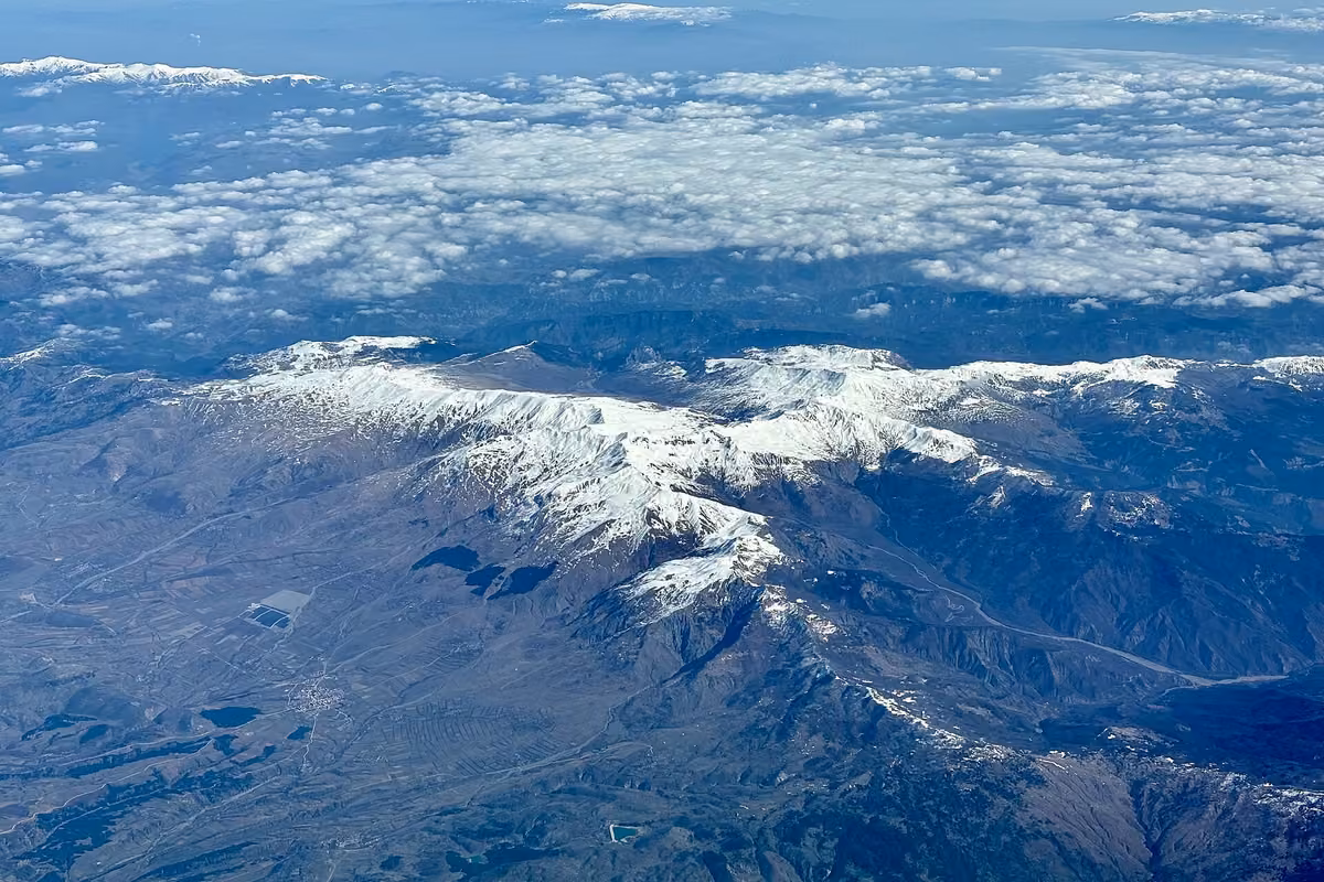 The Grammos range from the air, snow still lying on the tops