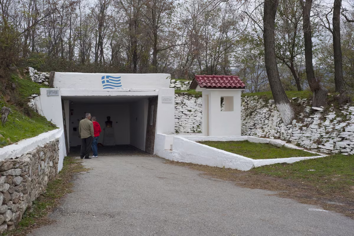 The whitewashed entrance of the Nymfaia Fort under bare November trees